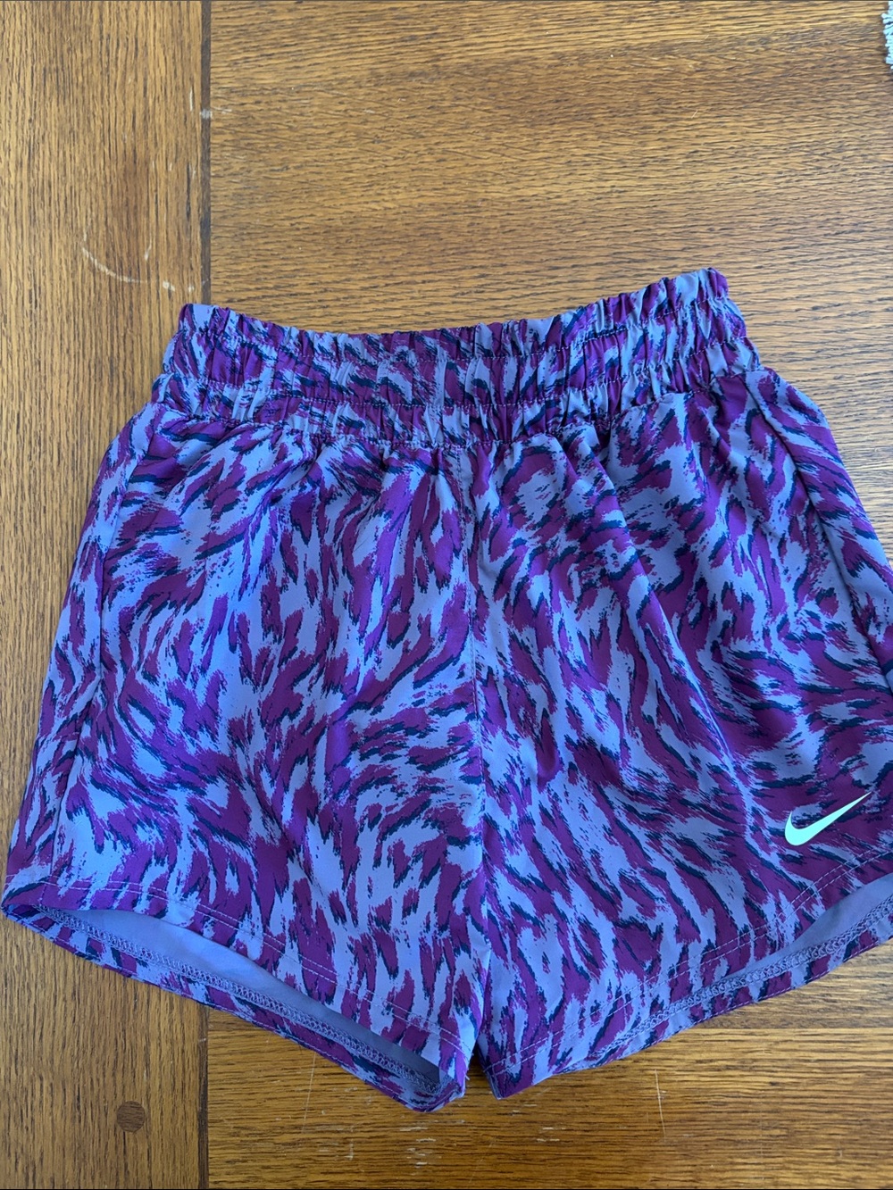 Nike Kid”s Purple and Black Patterned Athletic Shorts